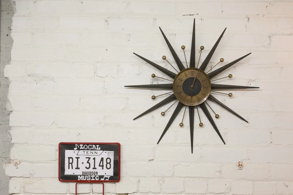 Tennessee License Plate mounted on wall of Nashville rental property.